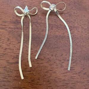 Gold tone bow earrings - post style
